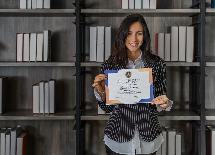 woman holding certificate